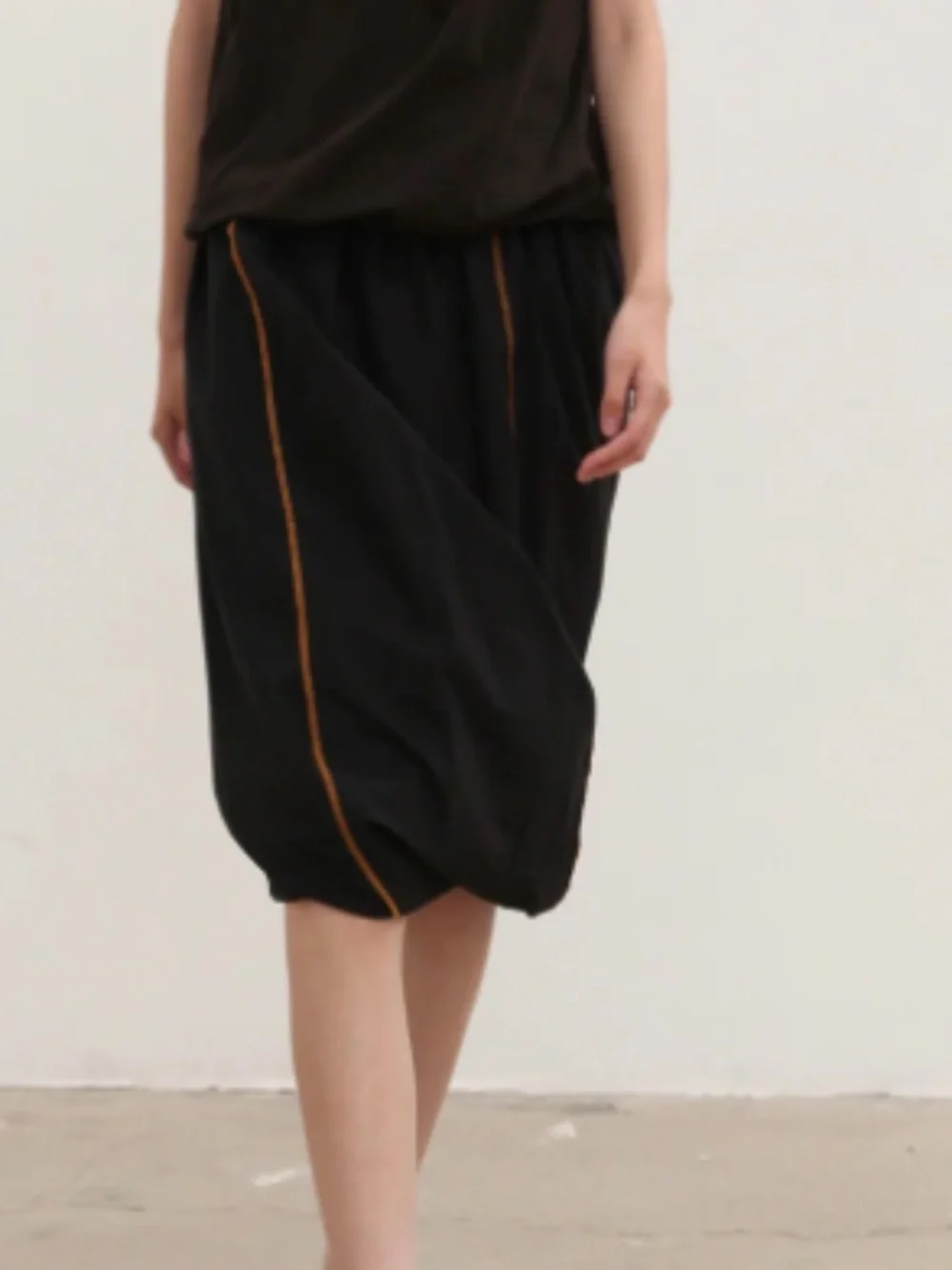 BASERANGE The Turn Skirt In Black Organic Cotton Contrast Stitch Twisted Seams